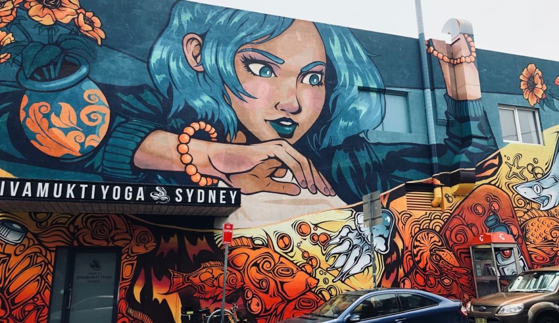 Sydney street art girl with flowers and fish