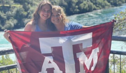 Madeline with Texas A&M flag